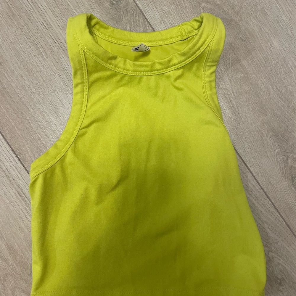 Two workout shirts one small and one medium